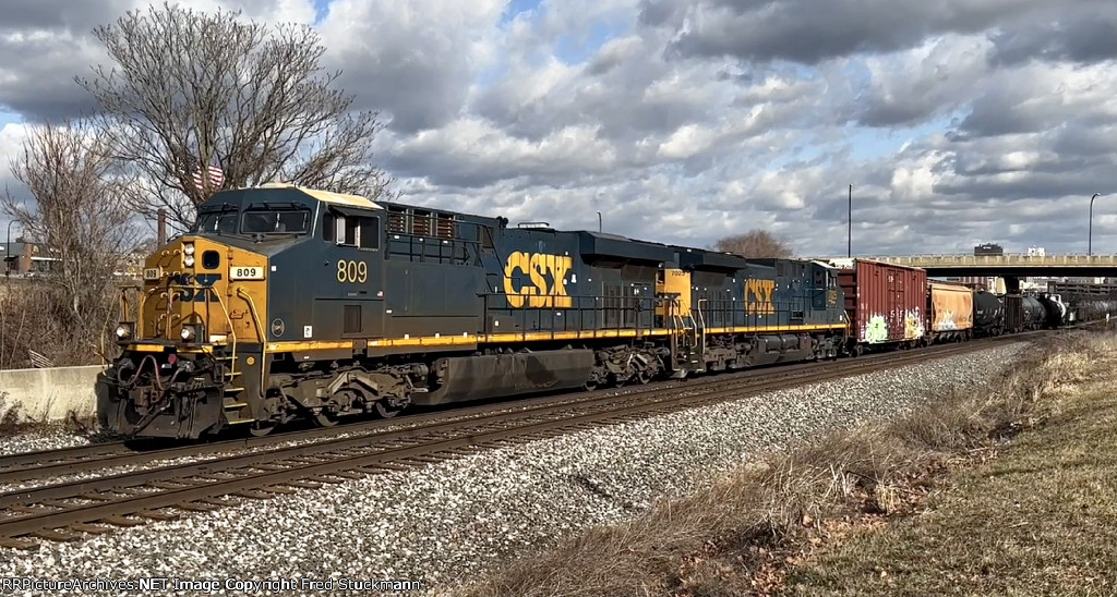 CSX 809 leads my favorite kind of train, a mixer.